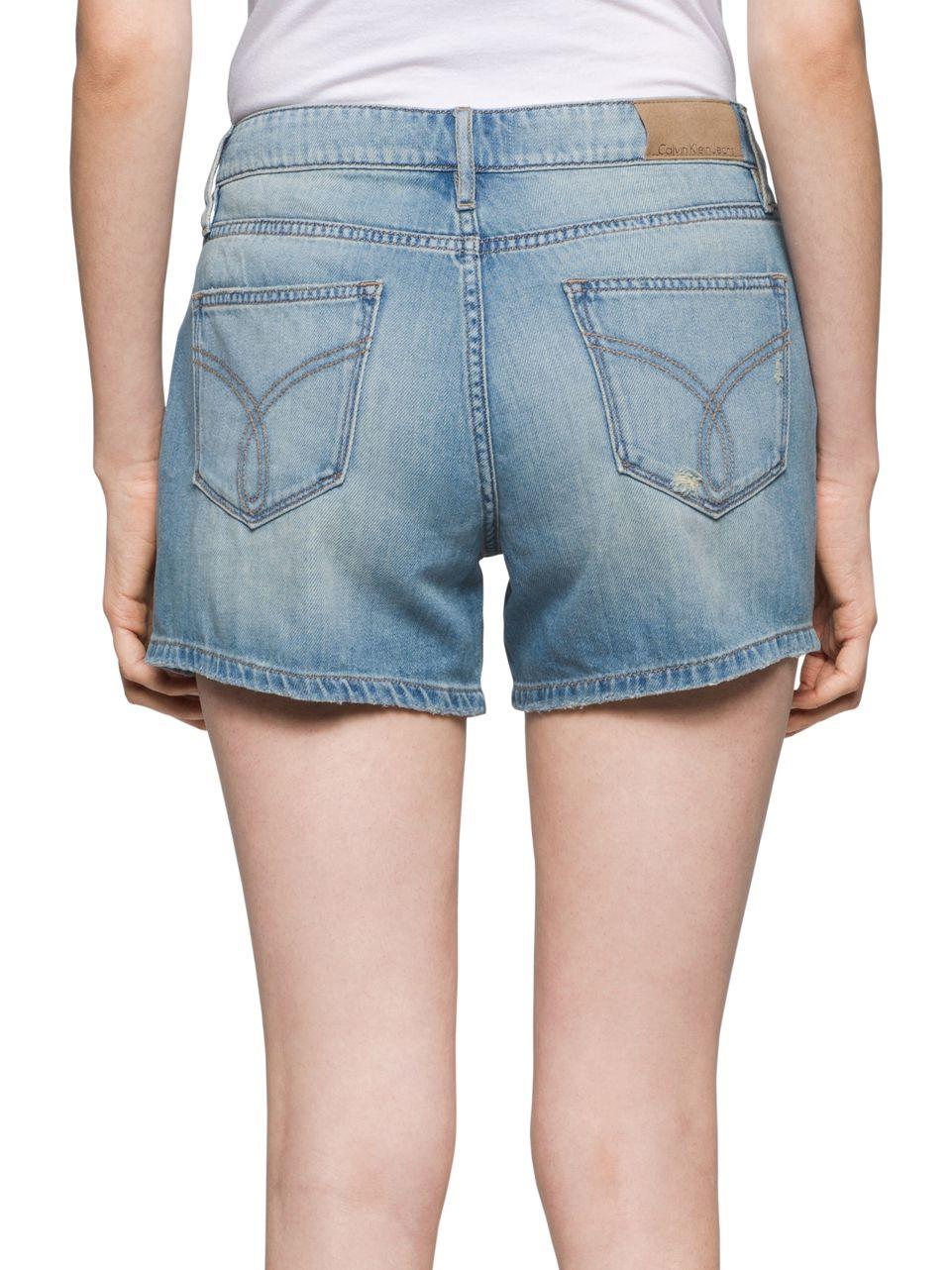 Lyst Calvin Klein Distressed Cotton Denim Shorts in Blue